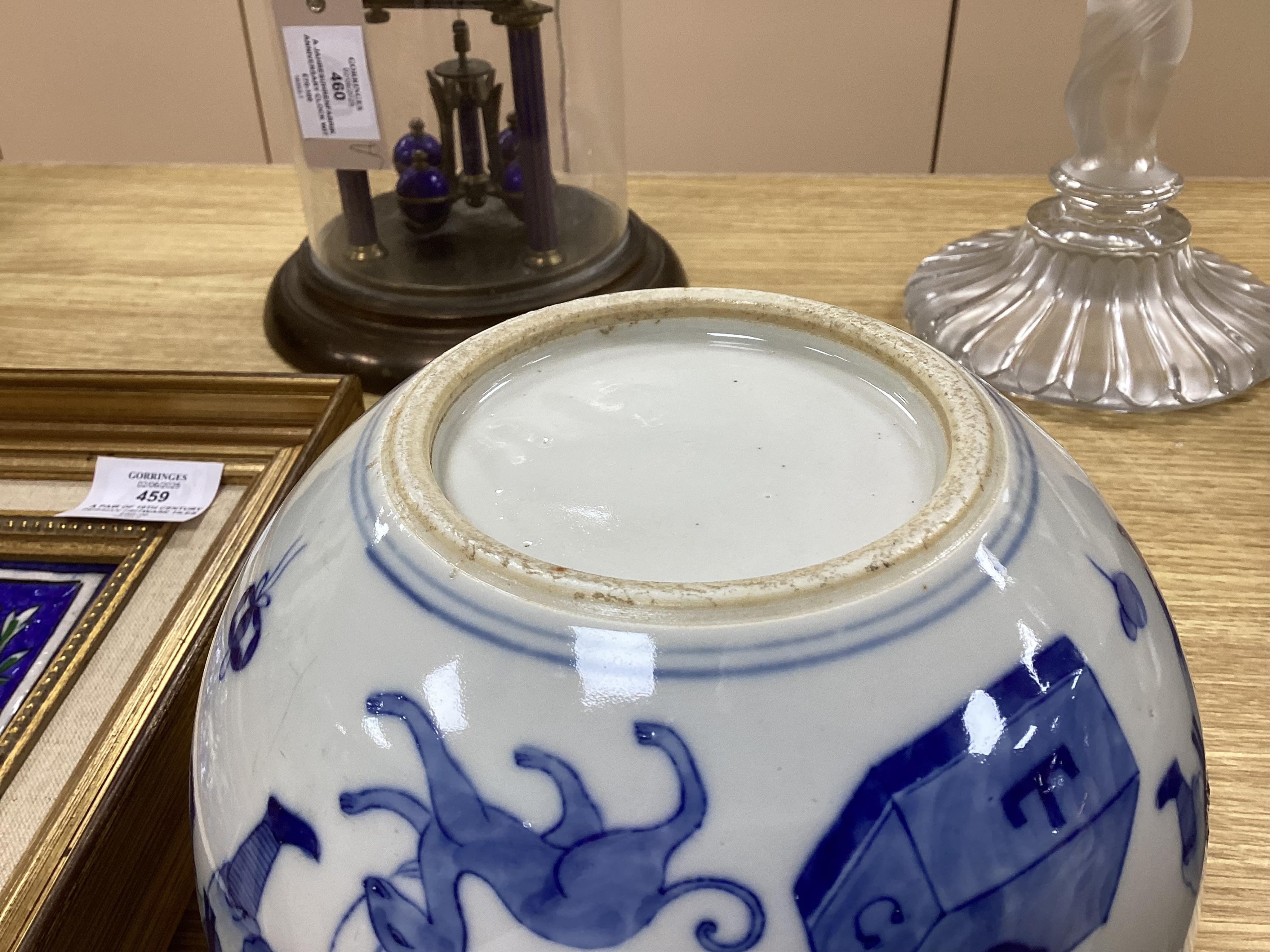 A small Chinese blue and white jardiniere painted with figures at various pursuits, 19cm in diameter